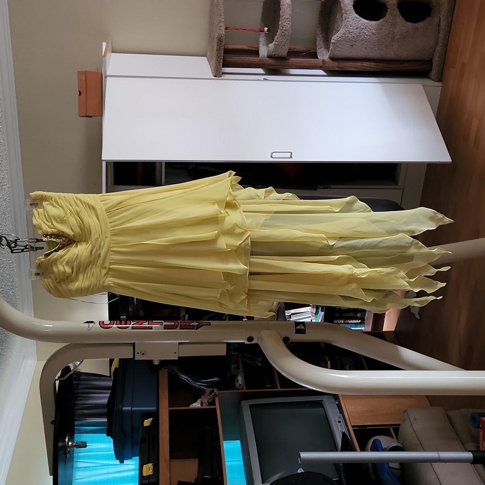 Yellow strapless high low dress size 11/12. Worn once.